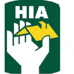 The hia logo with a hand holding a house.