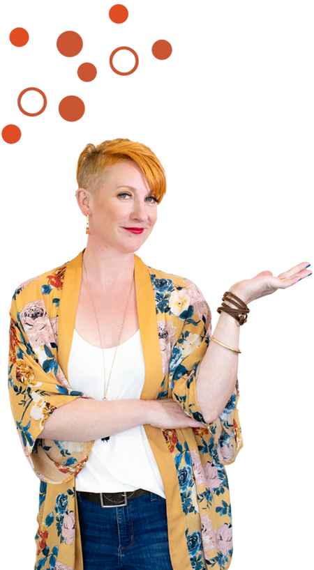 A woman in a floral kimono posing with her arms outstretched.