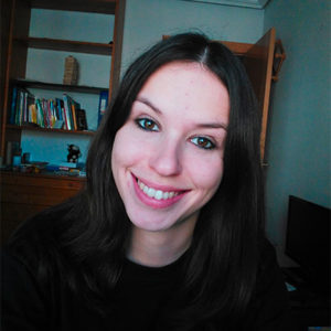 A woman wearing a black shirt.