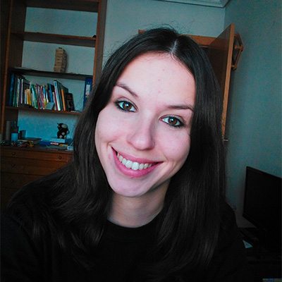 A woman wearing a black shirt.