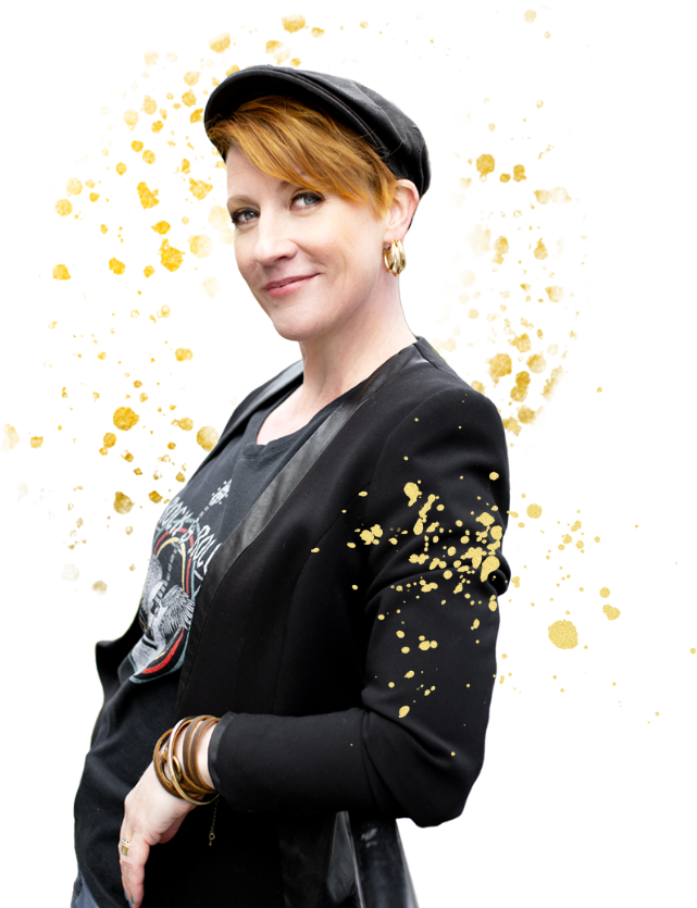 A woman wearing a black jacket and a gold hat.