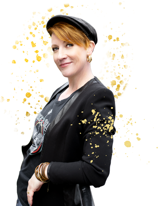 A woman wearing a black jacket and a gold hat.