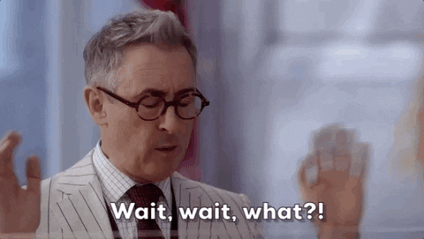 A man looks surprised and says Wait Wait What?